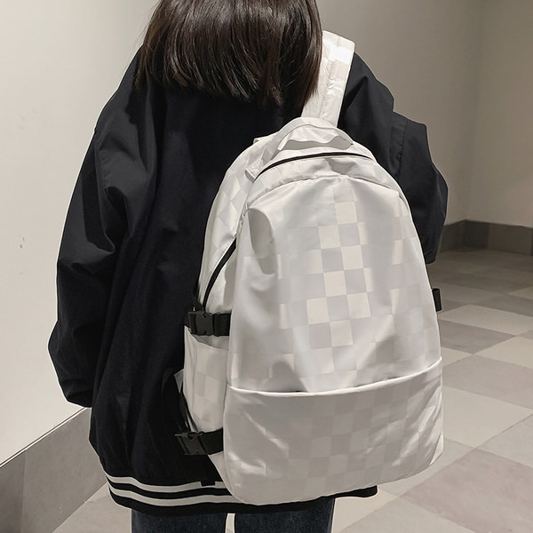 Női kockás hátizsák és cipzár