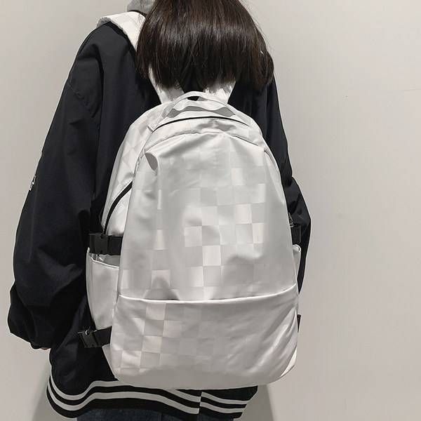 Női kockás hátizsák és cipzár