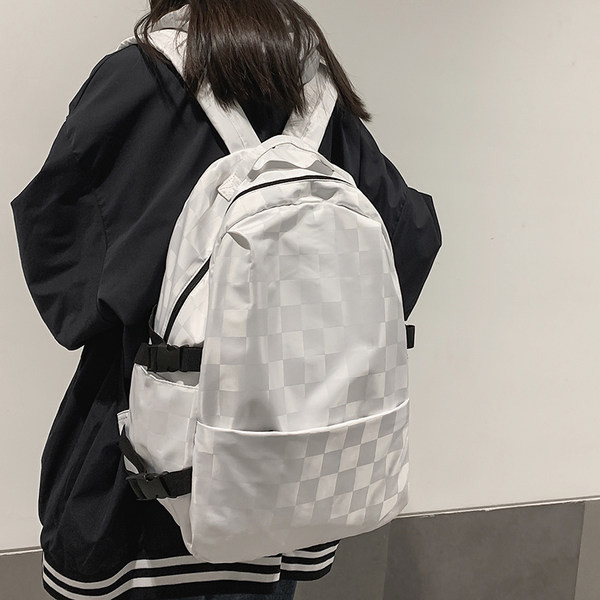 Női kockás hátizsák és cipzár