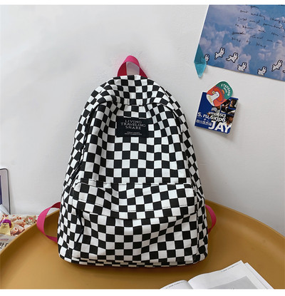 Σύγχρονο γυναικείο καρό σακίδιο πλάτης με φερμουάρ και επιγραφή