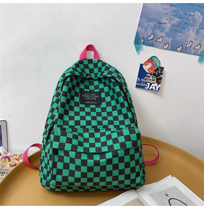 Σύγχρονο γυναικείο καρό σακίδιο πλάτης με φερμουάρ και επιγραφή