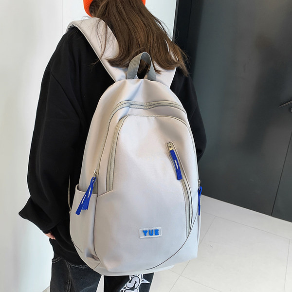 Tekstiilist multifunktsionaalne lukuga seljakott