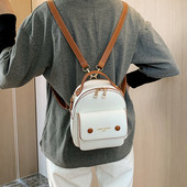 Naiste nahast seljakott kolmes värvitoonis esitaskuga