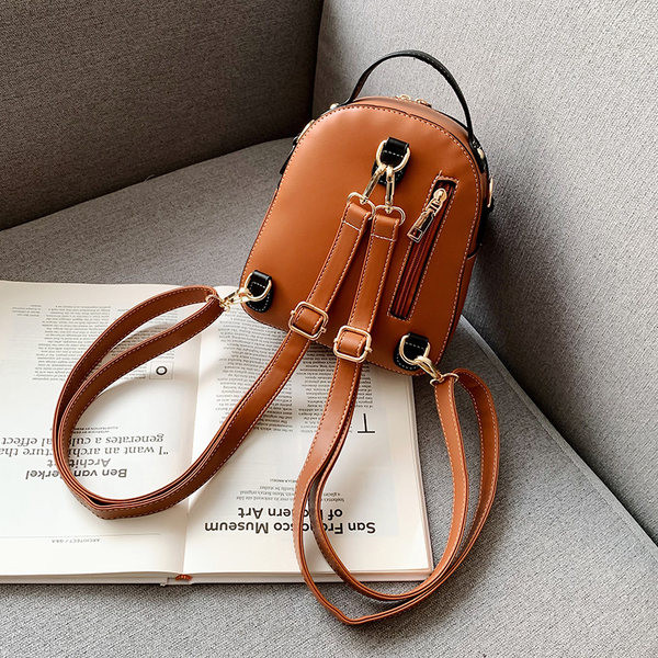 Naiste nahast seljakott kolmes värvitoonis esitaskuga