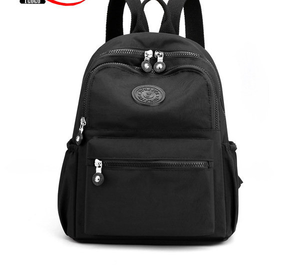 Väike lukuga tekstiilist seljakott - naistele