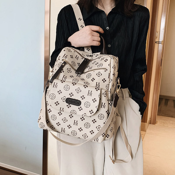 Naiste kunstnahast aplikatsiooniga seljakott