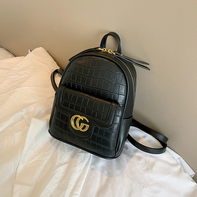 Naiste ökonahast miniseljakott metallist kaunistuse ja tõmblukuga