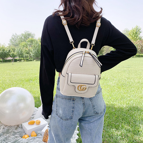 Naiste ökonahast miniseljakott metallist kaunistuse ja tõmblukuga