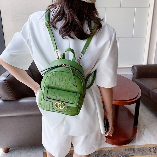 Naiste ökonahast miniseljakott metallist kaunistuse ja tõmblukuga