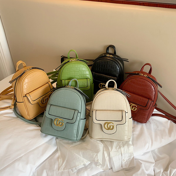 Naiste ökonahast miniseljakott metallist kaunistuse ja tõmblukuga