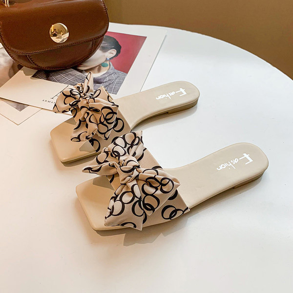 Стилни дамски чехли с панделка и равна подметка