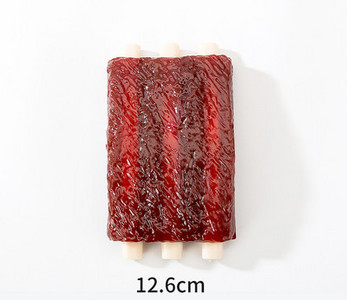 Jucărie pentru câini în formă de os