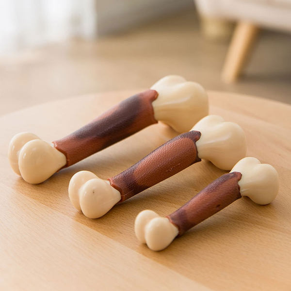 Jucărie pentru câini în formă de os