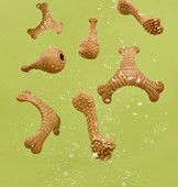 Kummist koerte luukujuline mänguasi