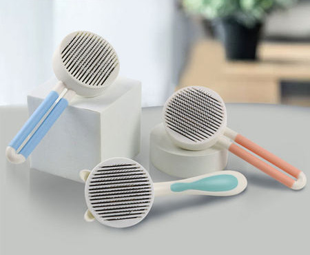 Ümmargune hari koerte kammimiseks - kaks suurust