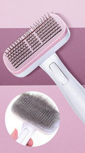 Pintsel koerte kammimiseks, mille funktsioon on lihtne eemaldada liigne karv