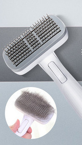 Pintsel koerte kammimiseks, mille funktsioon on lihtne eemaldada liigne karv