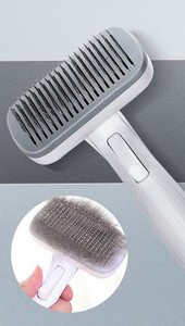 Pintsel koerte kammimiseks, mille funktsioon on lihtne eemaldada liigne karv