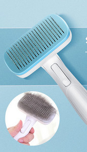 Pintsel koerte kammimiseks, mille funktsioon on lihtne eemaldada liigne karv