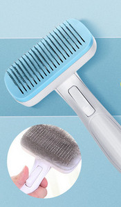 Pintsel koerte kammimiseks, mille funktsioon on lihtne eemaldada liigne karv