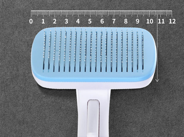 Pintsel koerte kammimiseks, mille funktsioon on lihtne eemaldada liigne karv