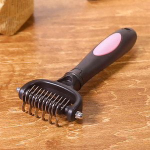 Pieptene de toaletare pentru caini