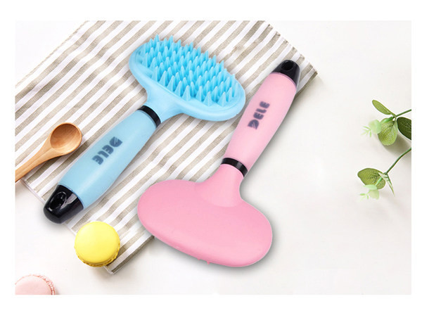 Perie de masaj din cauciuc pentru caini cu maner din plastic