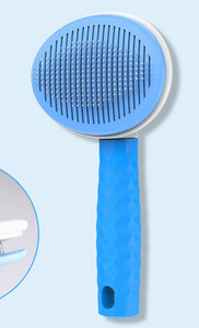 Ümmargune pintsel koera kammimiseks