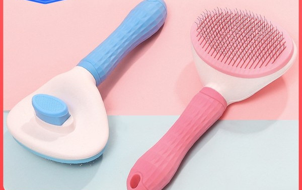 Perie pentru câini cu tăietoare metalice și mâner din plastic