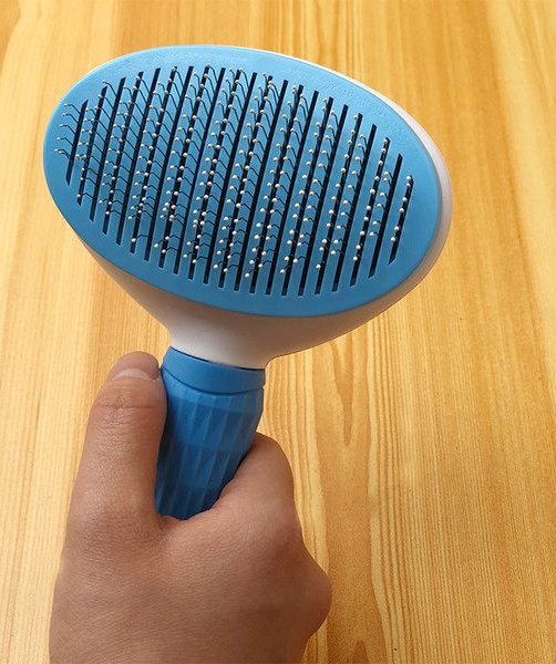 Ümmargune hari koera kammimiseks