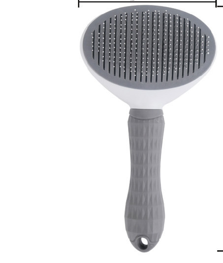 Pieptene rotund pentru pieptănarea unui câine