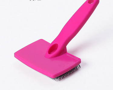 Plastikust käepidemega kamm - koerale