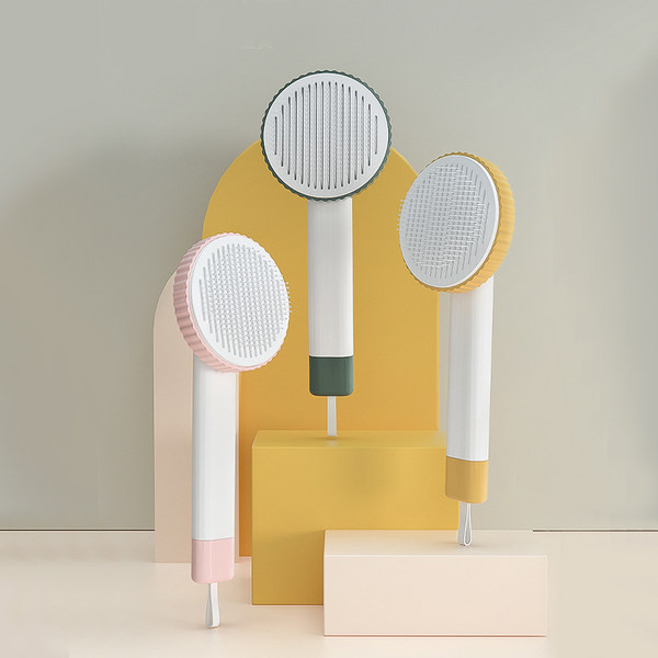 Pieptene pentru câini în formă rotundă de mai multe culori