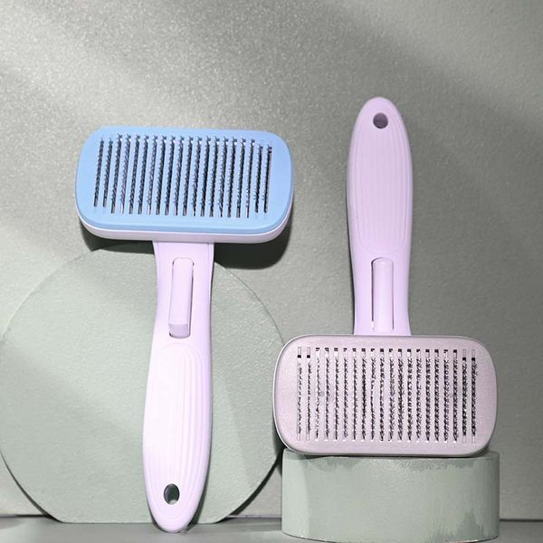 Četka za kućne ljubimce s gumbom za jednostavno čišćenje