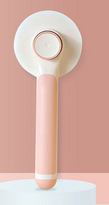 Βούρτσα σκύλου σε στρογγυλό σχήμα και πλαστική λαβή