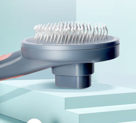 Βούρτσα σκύλου σε στρογγυλό σχήμα και πλαστική λαβή