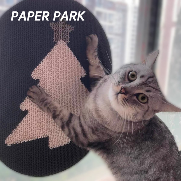 Ξύστρα γατών με το χριστουγεννιάτικο δέντρο