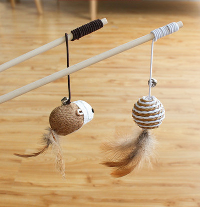 Cat toy with a feather