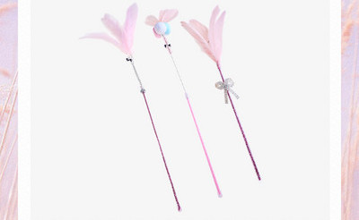 Kassi mängupulk sulgede ja metallist kaunistusega