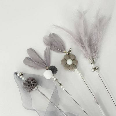 Õngeritv mänguasi udusulgede ja sulgedega