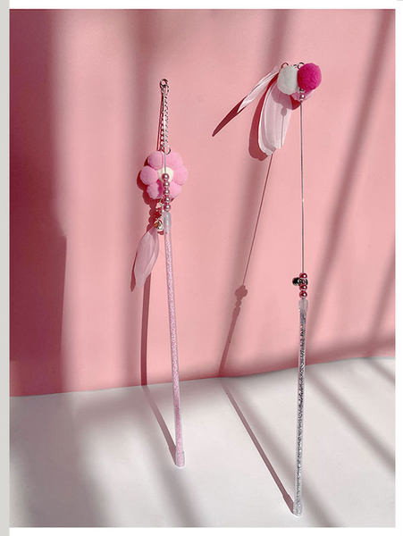 Õngeritv mänguasi udusulgede ja sulgedega