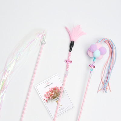 Igračka štap s perjem i metalnim elementima za mačke