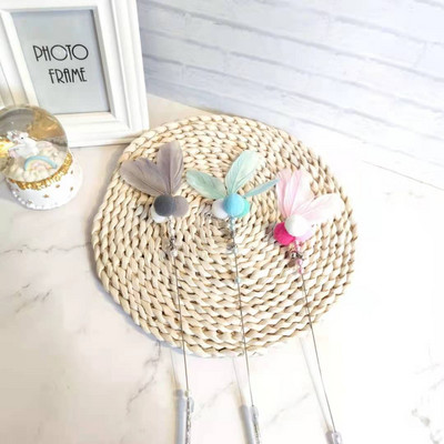 Παιχνίδι γάτας - ένα ραβδί με φτερά