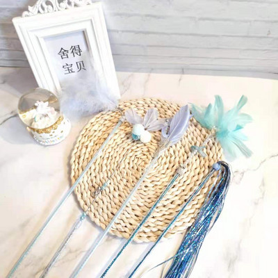 Παιχνίδι γάτας - ένα ραβδί με φτερά