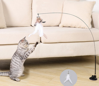 Mačka igračka zvono s perjem