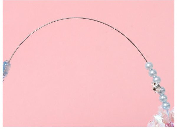 Παιχνίδι γάτας με ροζ φτερά