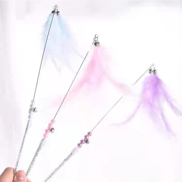 Παιχνίδι γάτας με ροζ φτερά