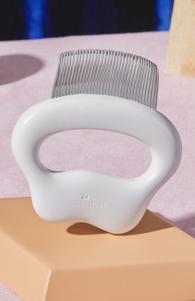 Μικρή συμπαγής χτένα για γούνα γάτας