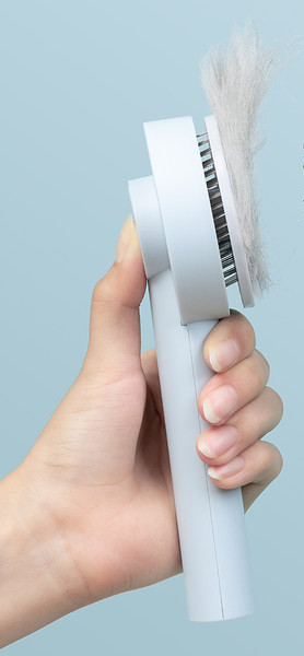 Kerge puhastusfunktsiooniga ümmargune hari kassidele