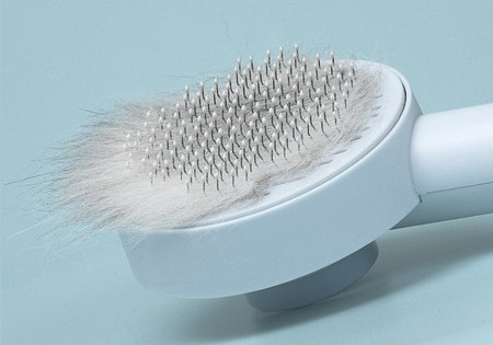 Kerge puhastusfunktsiooniga ümmargune hari kassidele